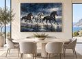 three running horses wall art in navy blue shown in a white frame in a modern interior