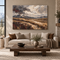 Open Territory: open prairie and distant mountains beneath a cloud-filled sky, stretched frameless room mockup